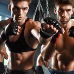 Mixed martial artists training in a gym