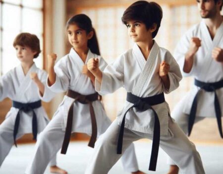 Kids practicing karate moves in a dojo