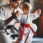 Toddler practicing martial arts with a coach in a training gym.