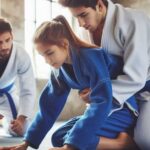 Young students practicing Brazilian Jiu-Jitsu on a mat.