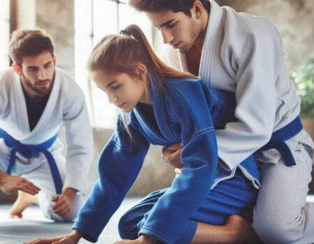 Young students practicing Brazilian Jiu-Jitsu on a mat.